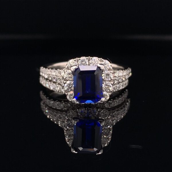 This Stunning Neil Lane Engagement ring and Band features a 1.50ct Emerald Cut Blue Sapphire and has an additional 1.50cts in the ring and band!!! This Bridal set is available for only $4500!!! Inquire Now!!!